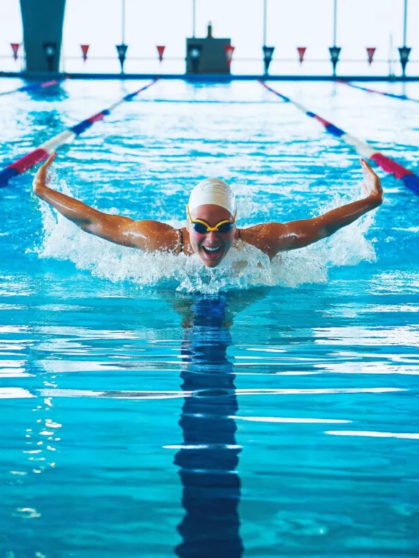 A swimmer mid butterfly